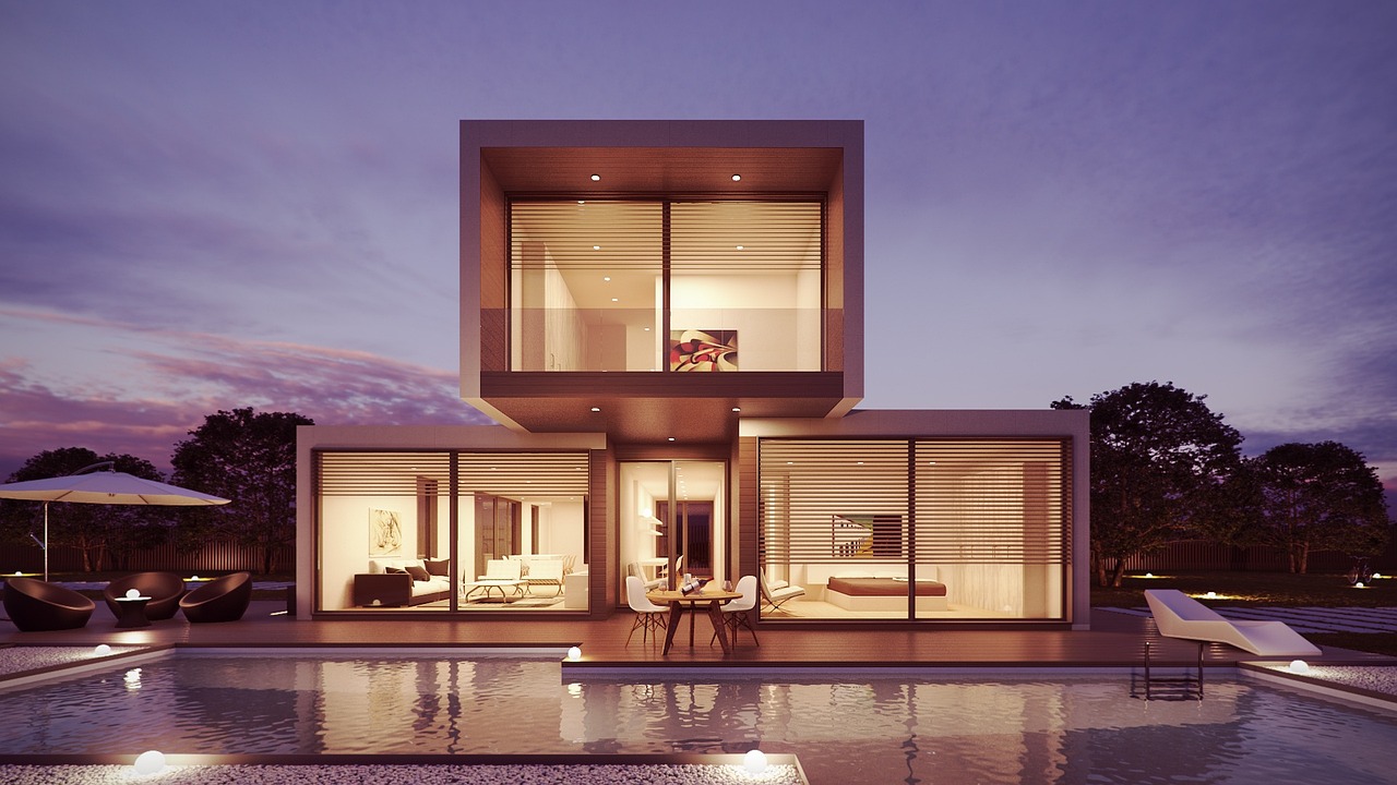 Modern luxury villa with warm interior lighting at dusk